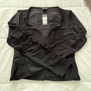 Black V-neck bodysuit by pretty little thing